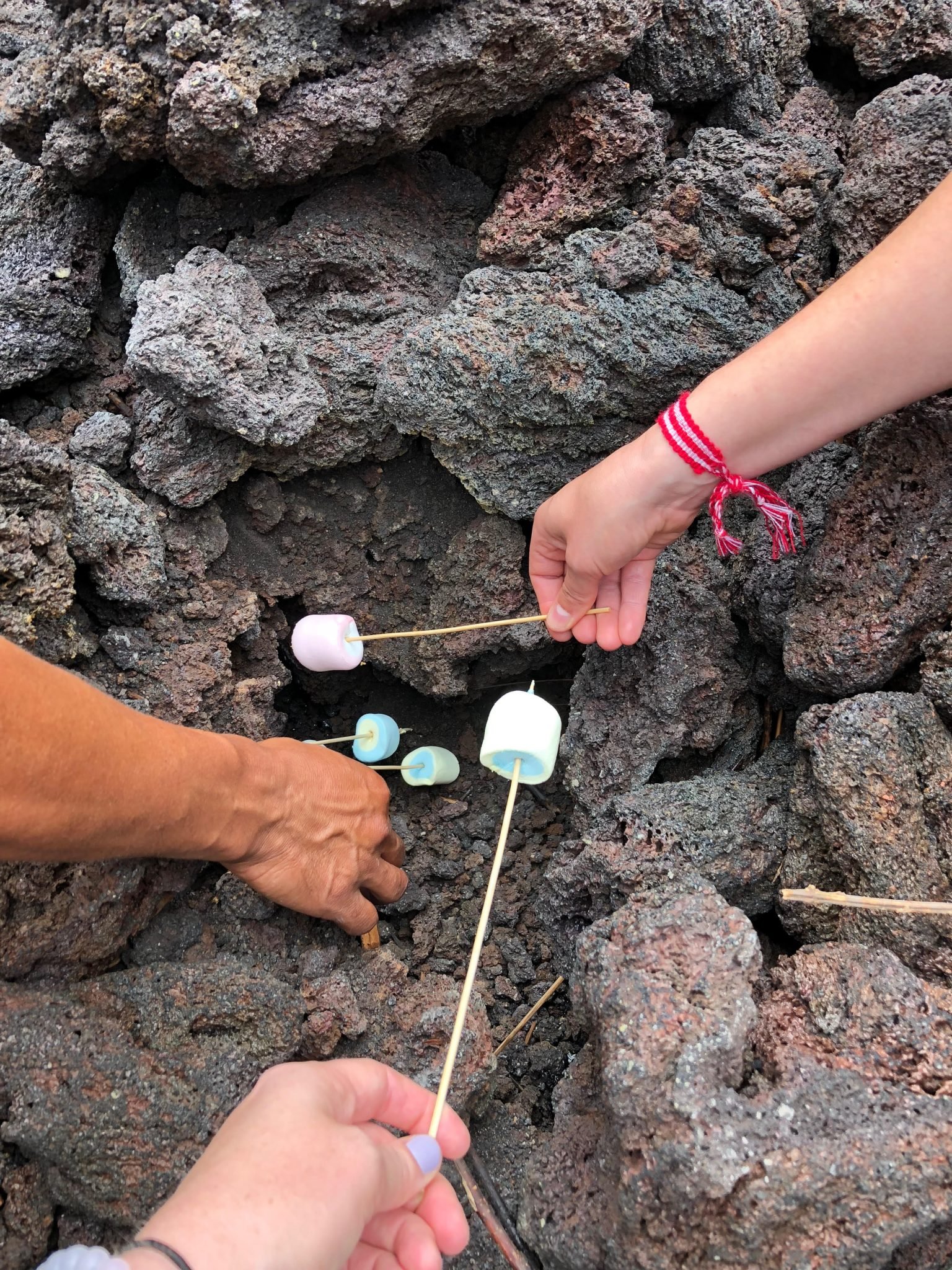 roasting marshmallows on the solidified hot lava of Pacaya Volcano
